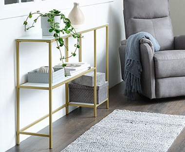 Metal and tempered glass console table in white and gold